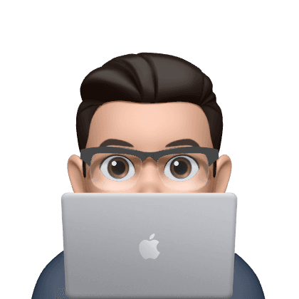 Person peeking from behind laptop